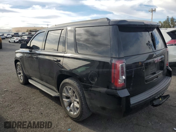 2019 GMC Yukon SLE with VIN 1GKS1AKC2KR101675, listed as a Copart auction lot 87256804 with 144,572 mi miles and Salvage Title. Bid and sale history available at carsss.com. Image 2.