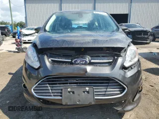 2016 Ford C-Max Energi SEL with VIN 1FADP5CU0GL101658, listed as a Copart auction lot 68214393 with 66,390 mi miles. Bid and sale history available at carsss.com. Image 5.