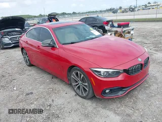 2019 BMW 4 Series 430i with VIN WBA4J1C52KBM16194, listed as a IAAI auction lot 41985890 with 74,788 mi miles. Bid and sale history available at carsss.com. Image 1.