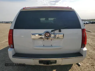 2009 Cadillac Escalade z VIN 1GYFK43559R235239, wystawiony jako Copart lot #59569495 z przebiegiem 142 969 mil mil oraz Tytuł czysty. Historia ofert i sprzedaży dostępna na DreamBid. Obrazek 6.