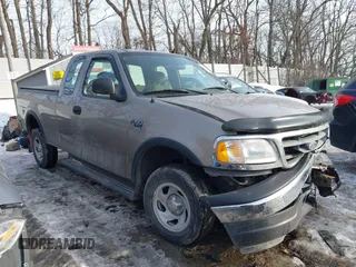 2003 Ford F-150 XL with VIN 2FTRX18W73CB07559, listed as a IAAI auction lot 41452402 with 152,509 mi miles. Bid and sale history available at carsss.com. Image 1.