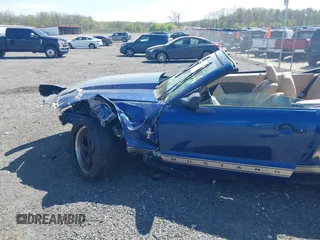 2006 Ford Mustang Standard z VIN 1ZVFT84N265125323, wystawiony jako IAAI lot #42093087 z przebiegiem 193 533 mil mil oraz . Historia ofert i sprzedaży dostępna na DreamBid. Obrazek 6.