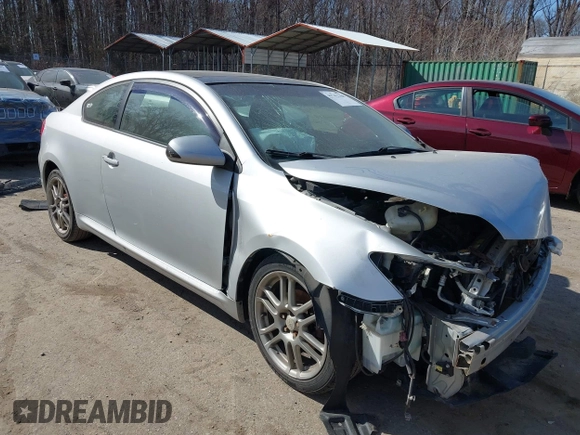 2005 Scion tC with VIN JTKDE177050043393, listed as a IAAI auction lot 41762368 with 170,244 mi miles. Bid and sale history available at carsss.com. Image 1.