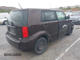 2009 Scion xB with VIN JTLKE50E291081243, listed as a IAAI auction lot 42033327 with 263,903 mi miles. Bid and sale history available at carsss.com. Image 4.
