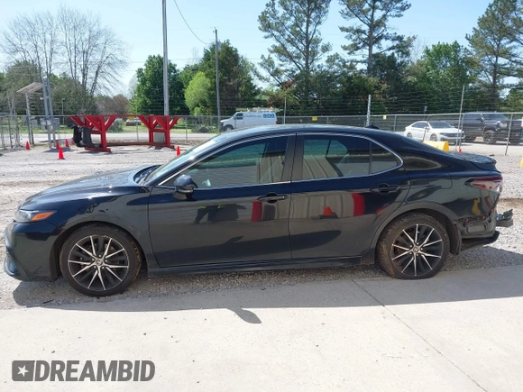 2022 Toyota Camry SE z VIN 4T1G11AK0NU657071, wystawiony jako IAAI lot #41991413 z przebiegiem 86 272 mil mil oraz . Historia ofert i sprzedaży dostępna na DreamBid. Obrazek 14.