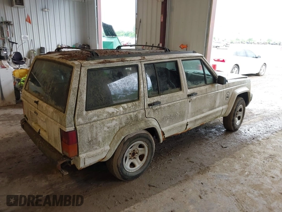 1996 Jeep Cherokee Sport with VIN 1J4FJ68S7TL263437, listed as a IAAI auction lot 42513022 with 158,561 mi miles and . Bid and sale history available at DreamBid. Image 4.