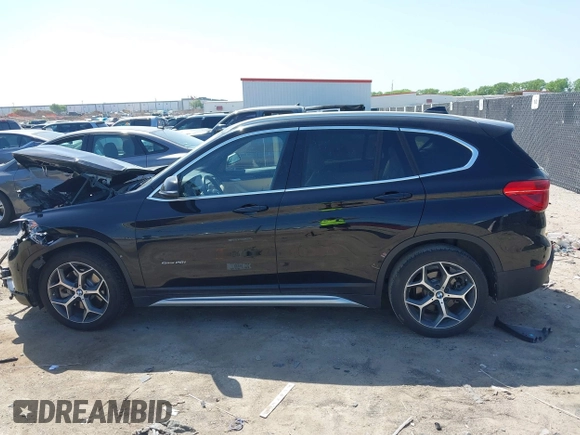 2017 BMW X1 sDrive28i z VIN WBXHU7C31H5H33748, wystawiony jako IAAI lot #42003198 z przebiegiem 71 274 mil mil oraz . Historia ofert i sprzedaży dostępna na DreamBid. Obrazek 14.