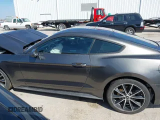 2016 Ford Mustang EcoBoost с VIN 1FA6P8TH3G5242922, выставлен на аукционе IAAI как лот 41893365 с пробегом 74 557 миль миль и . История ставок и продаж доступна на DreamBid. Изображение 15.