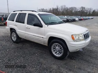 2002 Jeep Grand Cherokee Limited with VIN 1J8GX58N42C283956, listed as a IAAI auction lot 41553997 with 214,388 mi miles and . Bid and sale history available at DreamBid. Image 1.