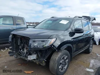2022 Honda Passport TrailSport with VIN 5FNYF8H60NB011632, listed as a IAAI auction lot 41779705 with 42,038 mi miles. Bid and sale history available at carsss.com. Image 2.