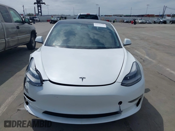 2021 Tesla Model 3 Performance with VIN 5YJ3E1EC2MF084594, listed as a IAAI auction lot 42030339 with 43,215 mi miles and . Bid and sale history available at DreamBid. Image 12.
