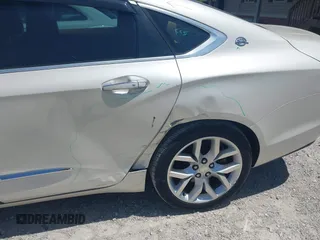 2014 Chevrolet Impala LTZ with VIN 1G1145SL9EU107666, listed as a IAAI auction lot 42147857 with 77,689 mi miles and . Bid and sale history available at DreamBid. Image 5.
