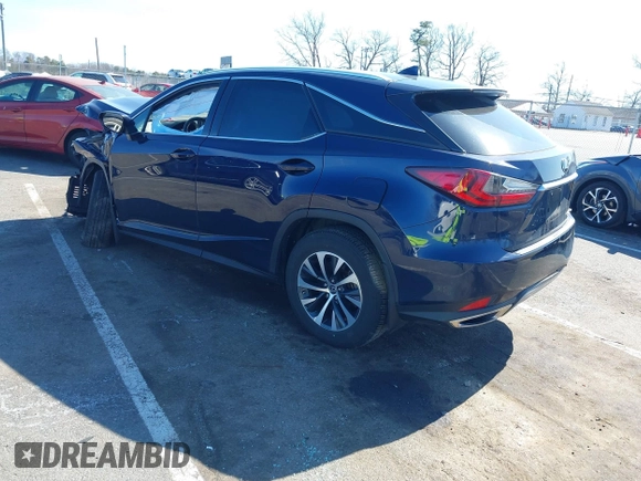 2022 Lexus RX with VIN 2T2HZMDA4NC358746, listed as a IAAI auction lot 41772090 with 26,370 mi miles. Bid and sale history available at carsss.com. Image 3.