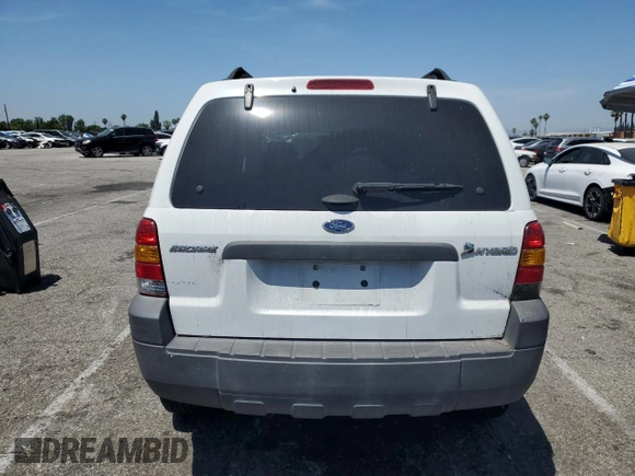 2007 Ford Escape Hybrid with VIN 1FMCU49H87KB61613, listed as a Copart auction lot 58083235 with 129,049 mi miles and Salvage title. Bid and sale history available at DreamBid. Image 6.