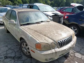 2003 Kia Optima LX z VIN KNAGD126235217242, wystawiony jako IAAI lot #42736488 z przebiegiem 221 309 mil mil oraz . Historia ofert i sprzedaży dostępna na DreamBid. Obrazek 1.