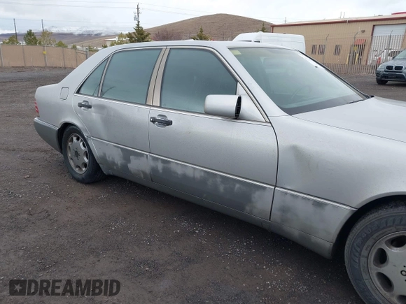 1994 Mercedes-Benz S with VIN WDBGA43E0RA162923, listed as a IAAI auction lot 42012249 with 107,498 mi miles and . Bid and sale history available at DreamBid. Image 6.