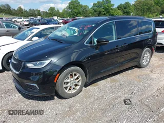 2022 Chrysler Pacifica Touring L with VIN 2C4RC1BG3NR106311, listed as a IAAI auction lot 42158651 with 68,473 mi miles and . Bid and sale history available at DreamBid. Image 2.
