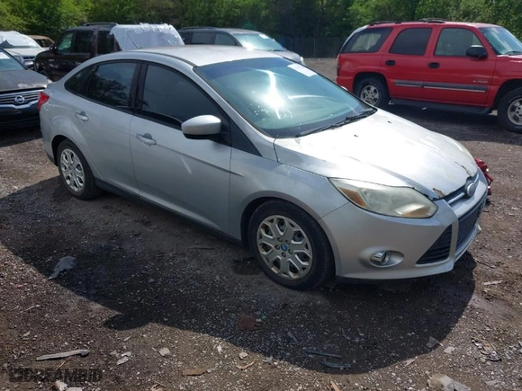 2012 Ford Focus SE with VIN 1FAHP3F22CL115877, listed as a IAAI auction lot 42031223 with 138,743 mi miles. Bid and sale history available at carsss.com. Image 1.