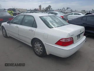 2004 Acura RL w/Navigation System z VIN JH4KA966X4C001584, wystawiony jako IAAI lot #42429042 z przebiegiem 290 258 mil mil oraz . Historia ofert i sprzedaży dostępna na DreamBid. Obrazek 3.