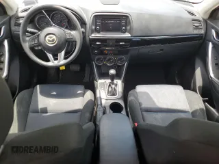 2014 Mazda CX-5 Sport z VIN JM3KE2BE8E0421316, wystawiony jako Copart lot #56548005 z przebiegiem 203 096 mil mil oraz Szkoda całkowita • Salvage title. Historia ofert i sprzedaży dostępna na DreamBid. Obrazek 8.
