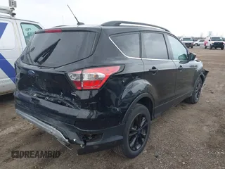 2017 Ford Escape SE with VIN 1FMCU0GD2HUD09575, listed as a IAAI auction lot 41952349 with 62,886 mi miles and . Bid and sale history available at DreamBid. Image 4.