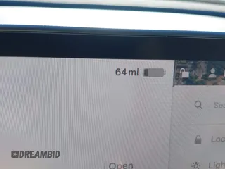 2023 Tesla Model Y Performance with VIN 7SAYGDEF2PF754938, listed as a IAAI auction lot 42067041 with 21,103 mi miles and . Bid and sale history available at DreamBid. Image 17.