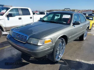 2002 Ford Crown Victoria Police Police Interceptor with VIN 2FAFP71W52X143053, listed as a IAAI auction lot 41594827 with 210,078 mi miles. Bid and sale history available at carsss.com. Image 2.