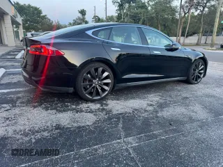 2014 Tesla Model S 60 with VIN 5YJSA1H10EFP49351, listed as a Copart auction lot 54173275 with 96,300 mi miles and Clean Title. Bid and sale history available at DreamBid. Image 4.