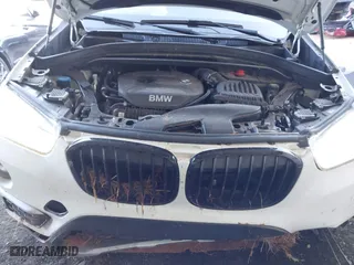 2018 BMW X1 xDrive28i with VIN WBXHT3C32J5K29627, listed as a IAAI auction lot 40995212 with 64,162 mi miles. Bid and sale history available at carsss.com. Image 10.