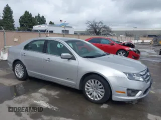 2010 Ford Fusion Hybrid with VIN 3FADP0L31AR406458, listed as a IAAI auction lot 41802042 with 225,678 mi miles. Bid and sale history available at carsss.com. Image 1.