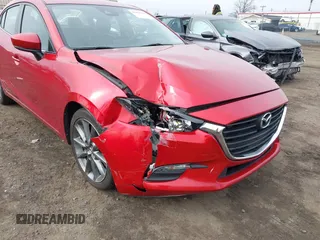 2018 Mazda 3 Touring with VIN 3MZBN1V36JM196315, listed as a IAAI auction lot 41856596 with 79,783 mi miles and . Bid and sale history available at DreamBid. Image 6.