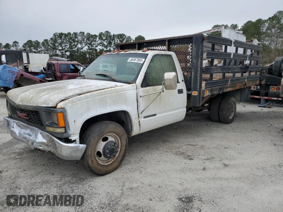 1999 GMC Sierra 1500 with VIN 1GDJC34R3XF087014, listed as a Copart auction lot 86367084 with 94,539 mi miles and Clean Title. Bid and sale history available at DreamBid. Image 1.