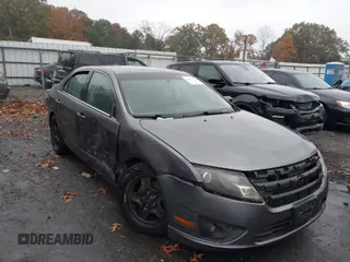 2011 Ford Fusion SE with VIN 3FAHP0HG4BR229273, listed as a IAAI auction lot 40851336 with 153,960 mi miles. Bid and sale history available at carsss.com. Image 1.