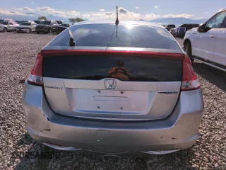 2010 Honda Insight LX with VIN JHMZE2H51AS011243, listed as a Copart auction lot 54445555 with 224,722 mi miles and Salvage Title. Bid and sale history available at DreamBid. Image 6.