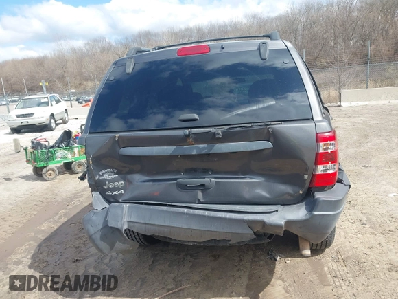 2004 Jeep Grand Cherokee Laredo z VIN 1J4GW48SX4C213322, wystawiony jako IAAI lot #41969362 z przebiegiem 273 876 mil mil oraz . Historia ofert i sprzedaży dostępna na DreamBid. Obrazek 16.