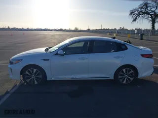 2016 Kia Optima SXL Turbo with VIN 5XXGV4L20GG023095, listed as a IAAI auction lot 41580598 with 155,002 mi miles. Bid and sale history available at carsss.com. Image 14.