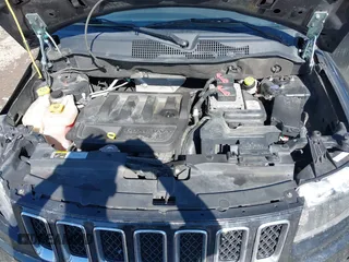 2014 Jeep Compass Sport with VIN 1C4NJDBB0ED567592, listed as a IAAI auction lot 41696070 with 150,303 mi miles. Bid and sale history available at carsss.com. Image 10.