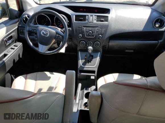 2012 Mazda 5 Grand Touring with VIN JM1CW2DL0C0139724, listed as a Copart auction lot 70640054 with 92,129 mi miles and Salvage Title. Bid and sale history available at DreamBid. Image 8.