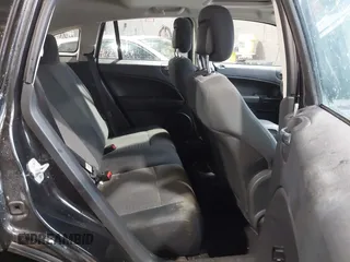 2011 Dodge Caliber Rush with VIN 1B3CB8HB5BD108767, listed as a IAAI auction lot 41820107 with 145,101 mi miles. Bid and sale history available at carsss.com. Image 8.