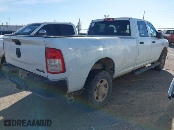2024 Ram 2500 Tradesman with VIN 3C6UR5HL7RG157723, listed as a IAAI auction lot 41128531 with 56,820 mi miles and . Bid and sale history available at DreamBid. Image 4.