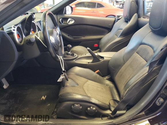 2013 Nissan 370Z Touring with VIN JN1AZ4FH7DM790607, listed as a Copart auction lot 57915234 with 11,487 mi miles and Salvage Title. Bid and sale history available at carsss.com. Image 7.
