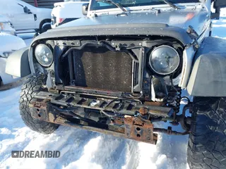 2008 Jeep Wrangler Unlimited Rubicon with VIN 1J4GA69198L615547, listed as a IAAI auction lot 41351138 with 213,487 mi miles and . Bid and sale history available at DreamBid. Image 6.