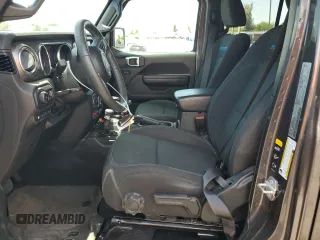 2023 Jeep Wrangler Rubicon z VIN 1C4JJXR65PW557849, wystawiony jako Copart lot #57845705 z przebiegiem 21 849 mil mil oraz Szkoda całkowita • Salvage title. Historia ofert i sprzedaży dostępna na DreamBid. Obrazek 7.