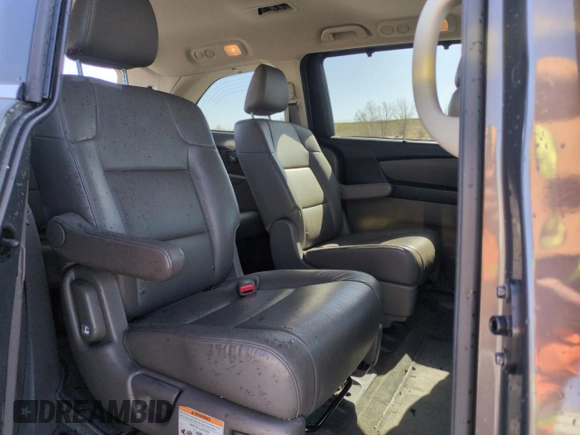 2014 Honda Odyssey Touring with VIN 5FNRL5H95EB052523, listed as a Copart auction lot 52214055 with 131,350 mi miles and Salvage Title. Bid and sale history available at DreamBid. Image 11.