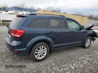 2014 Dodge Journey SXT with VIN 3C4PDCBB2ET156070, listed as a Copart auction lot 51189955 with 82,638 mi miles and Salvage Title. Bid and sale history available at DreamBid. Image 3.