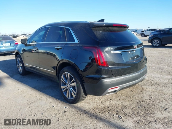 2024 Cadillac XT5 FWD Premium Luxury with VIN 1GYKNCRS4RZ729461, listed as a IAAI auction lot 41411300 with 5,760 mi miles. Bid and sale history available at carsss.com. Image 3.