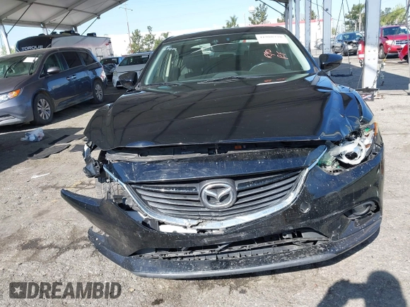2015 Mazda 6 i Grand Touring with VIN JM1GJ1W61F1165006, listed as a IAAI auction lot 41988778 with 113,226 mi miles and . Bid and sale history available at carsss.com. Image 6.