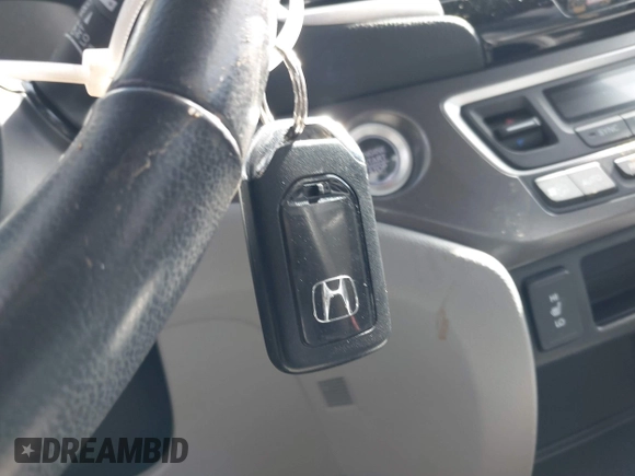2017 Honda Ridgeline RTL-T with VIN 5FPYK2F68HB001759, listed as a IAAI auction lot 41562343 with 59,633 mi miles and . Bid and sale history available at DreamBid. Image 11.