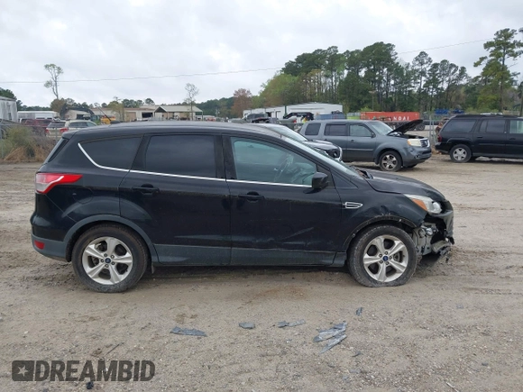 2016 Ford Escape SE with VIN 1FMCU9G99GUC13053, listed as a IAAI auction lot 41888535 with 84,019 mi miles. Bid and sale history available at carsss.com. Image 13.