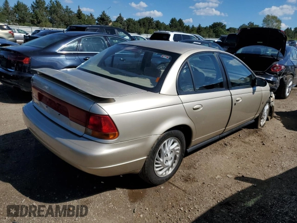 1998 Saturn SL with VIN 1G8ZK5272WZ253120, listed as a Copart auction lot 72911384 with 140,198 mi miles and Salvage title. Bid and sale history available at DreamBid. Image 3.